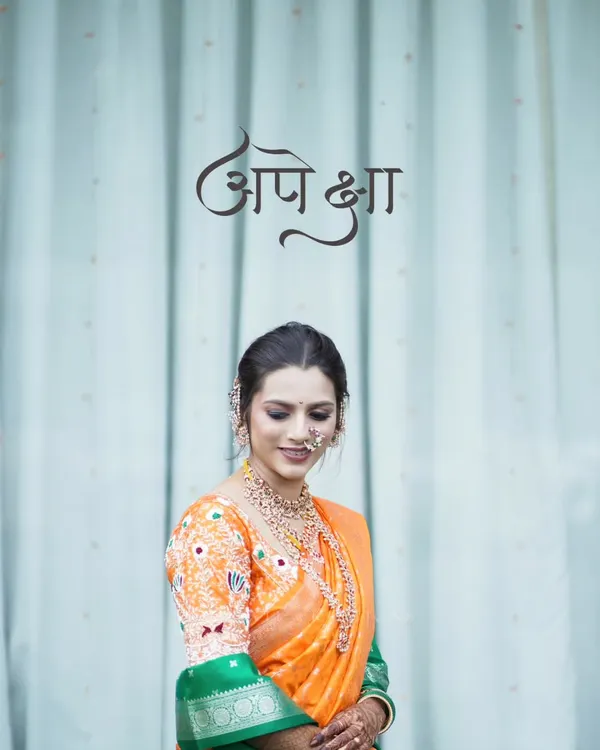 A simple, elegant portrait of the bride, with her name beautifully written in calligraphy. This is her moment.