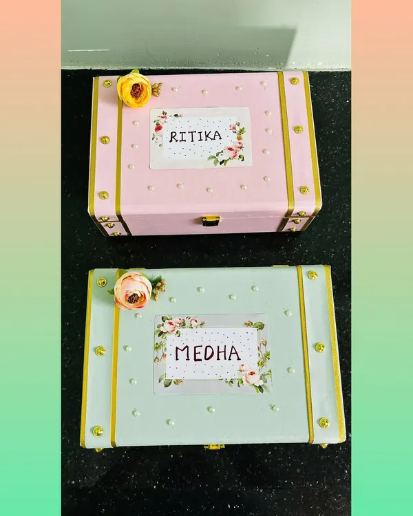 The perfect way to propose to your bridesmaids. We created these matching personalized trunks in pink and mint green, each with a custom floral name tag for a bride's best friends.