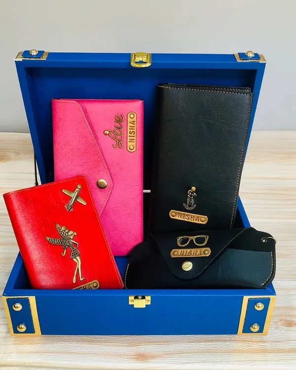 A beautiful travel accessories hamper I put together for a client, all packed in a personalized royal blue trunk box. This set includes custom name wallets, a passport holder, and a spectacle case, making it a perfect gift for a destination wedding or a travel-loving friend.