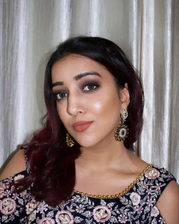 A classic black smokey eye is timeless. This look is all about elevating the eyes with a touch of mystery and drama, perfect for a cocktail party or reception.