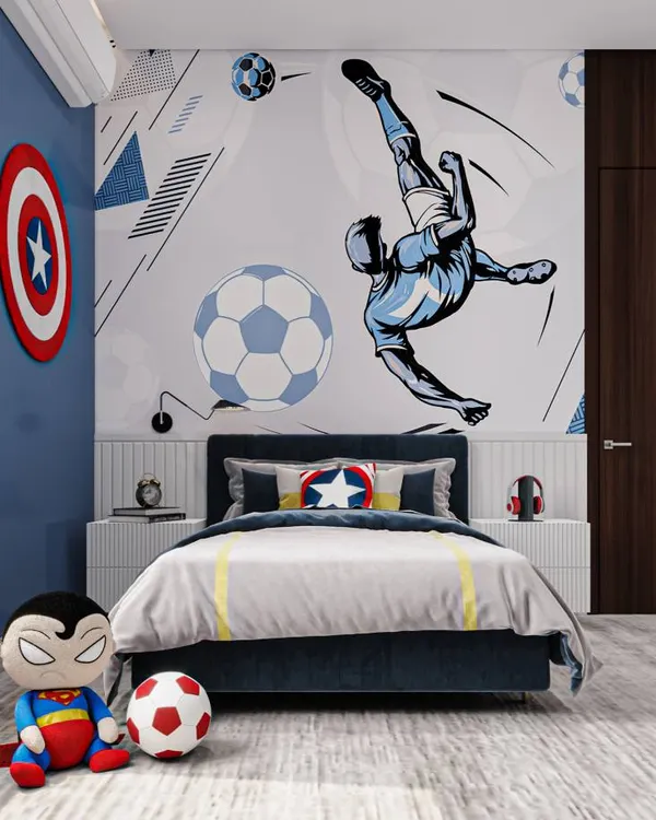 A dream room for a young superhero and football fan. I used a dynamic wall mural, a Captain America shield, and themed bedding to create an action-packed space that's full of energy.