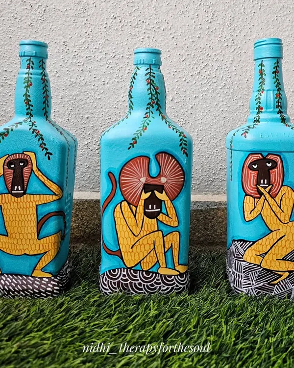 Here is another view of the three wise monkeys bottle art set. The bright turquoise background makes the figures pop, and each bottle tells a part of the story.