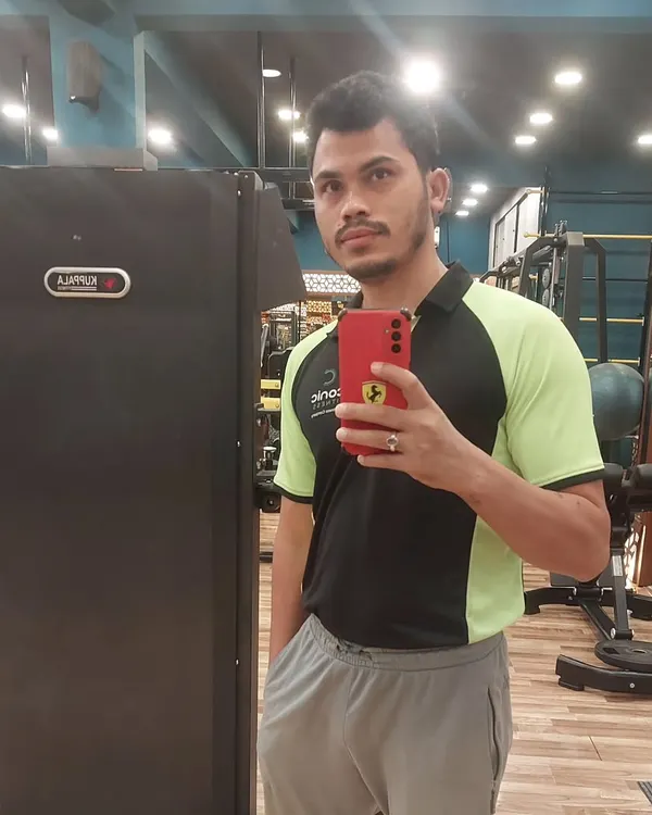 A quick selfie at the gym. This is my second home, where I help clients and work on my own fitness.