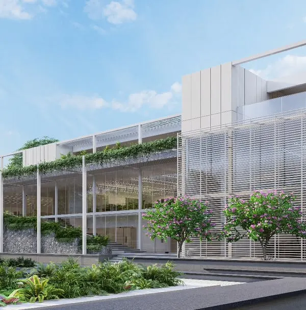 The MOSPO office building in Bangalore features a transparent, multi-story facade with integrated greenery and louvers for sun shading. Our design aims to create a healthy and productive work environment by maximizing natural light and views.