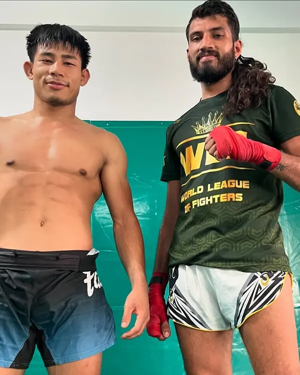 Two of our Muay Thai specialists after a tough sparring session. Iron sharpens iron.