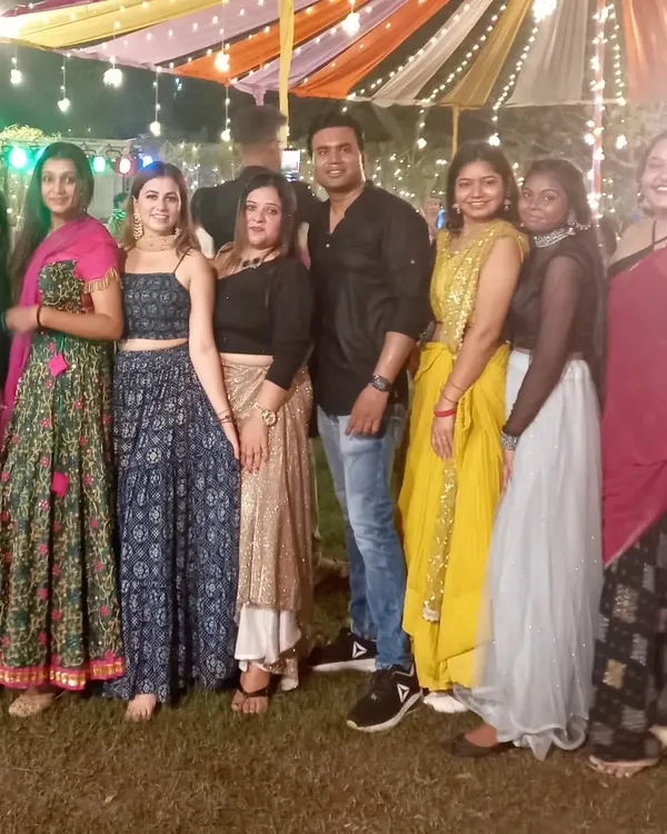 A photo with our amazing students after a successful sangeet night performance. Seeing the joy and confidence on their faces is the best reward for us as choreographers.