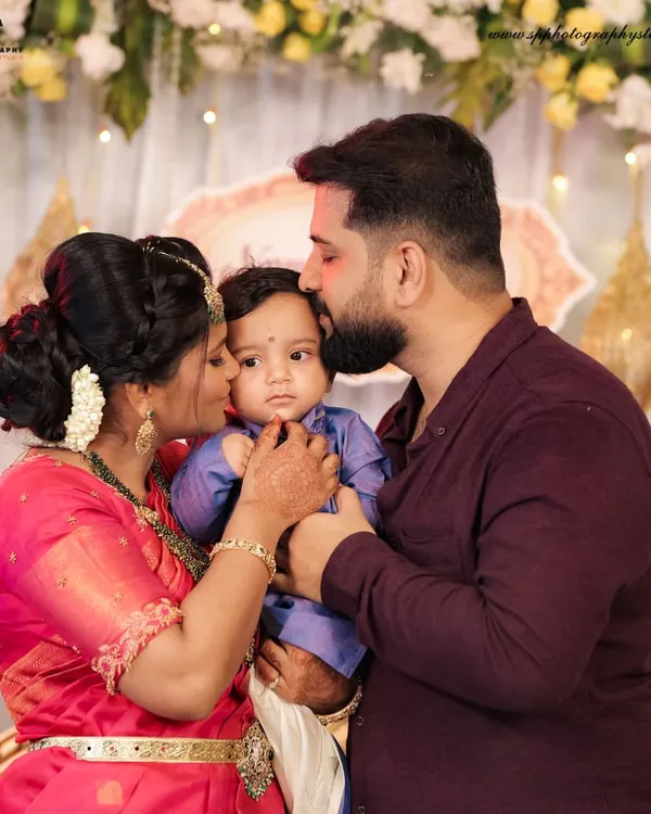(Hero Media) We believe the most beautiful portraits capture the quiet, loving connections within a family. This tender moment between parents and their newborn is a perfect example of the timeless images we strive to create.