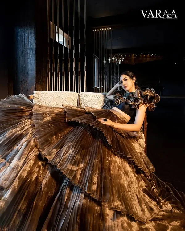 A dramatic, high-fashion look for a magazine cover shoot with actress Ritu Varma. I styled her in this incredible tiered metallic gown, creating a powerful and glamorous editorial image.