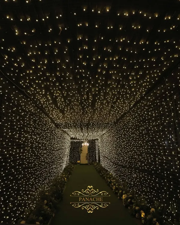 We created a breathtaking entrance for this cocktail night with a tunnel made entirely of fairy lights. It felt like walking through a galaxy of stars, setting a magical tone for the evening.