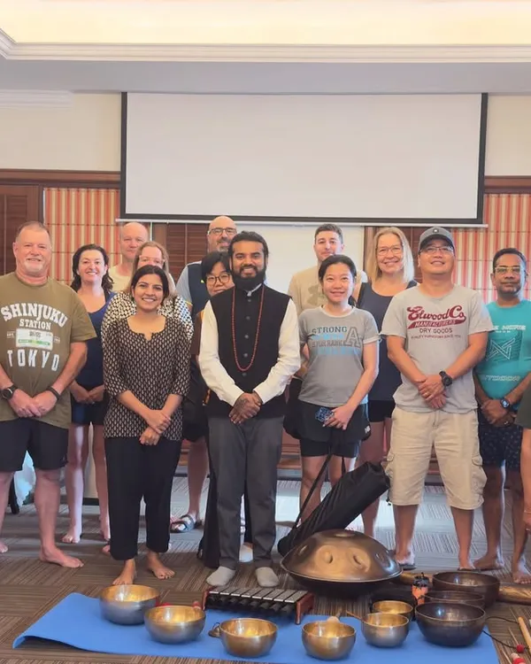 A group photo after a holistic wellness workshop for senior managers and expats. It's a privilege to bring these ancient practices into the corporate world to support leadership and well-being.