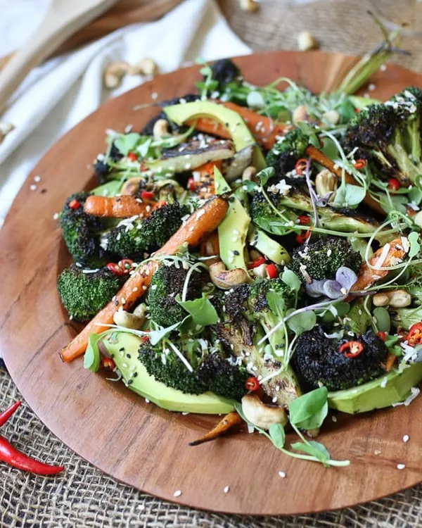 My grilled broccoli, carrot, and avocado salad is a perfect example of a gluten-free and vegan meal. It's packed with fresh vegetables, creamy avocado, and a flavourful dressing, making it a refreshing and satisfying option.
