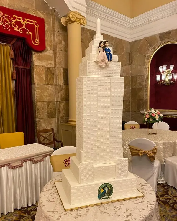 There's always a beautiful story behind a wedding cake. For this one, the couple wanted a replica of the Empire State Building, and we were so happy to create this towering, detailed structure for their special day. I can only imagine their love story started there!