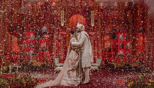 A moment of pure magic. We believe a wedding should feel generous and full of joy, and for this ceremony, we created an entire temple structure, enveloping the couple in a shower of petals and blessings. This is what it looks like when love, tradition, and grand design come together.