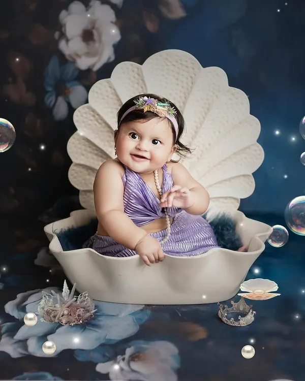 A magical little mermaid found in a seashell. I love bringing fantasy themes to life, and this underwater-inspired setup with pearls and bubbles is absolutely dreamy.
