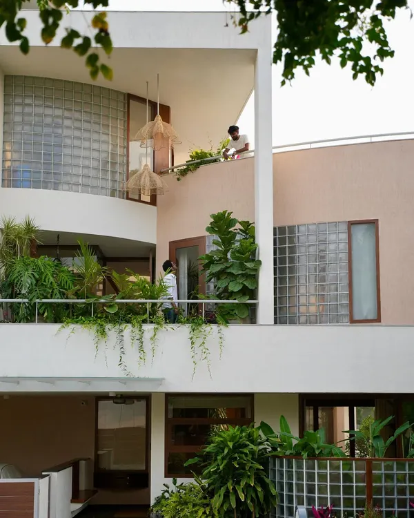 This is a sketch brought to life. The balconies are designed as integral parts of the landscape, with deep planters supporting lush greenery that cascades down the building's facade.