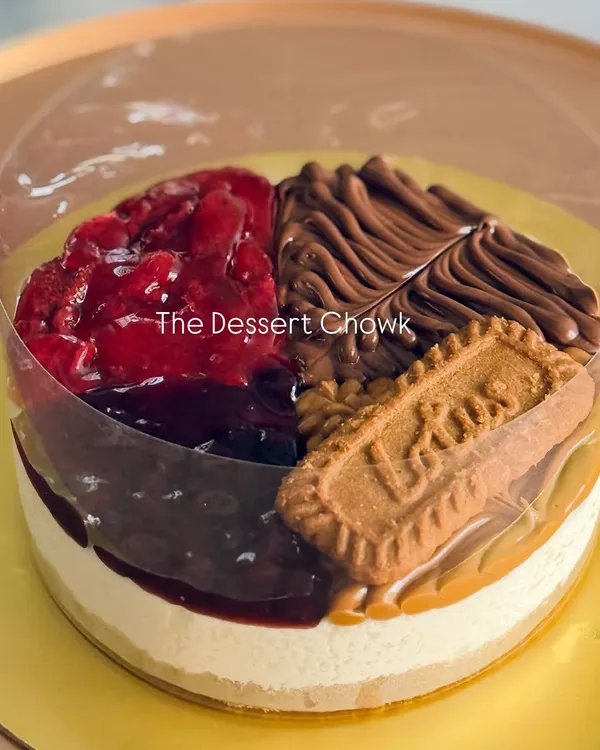 This is my assorted no-bake cheesecake, a perfect way to try four of my most loved flavors in one dessert: rich Nutella, tangy Strawberry, classic Blueberry, and spiced Lotus Biscoff. It's 100% eggless with a creamy, melt-in-your-mouth texture.