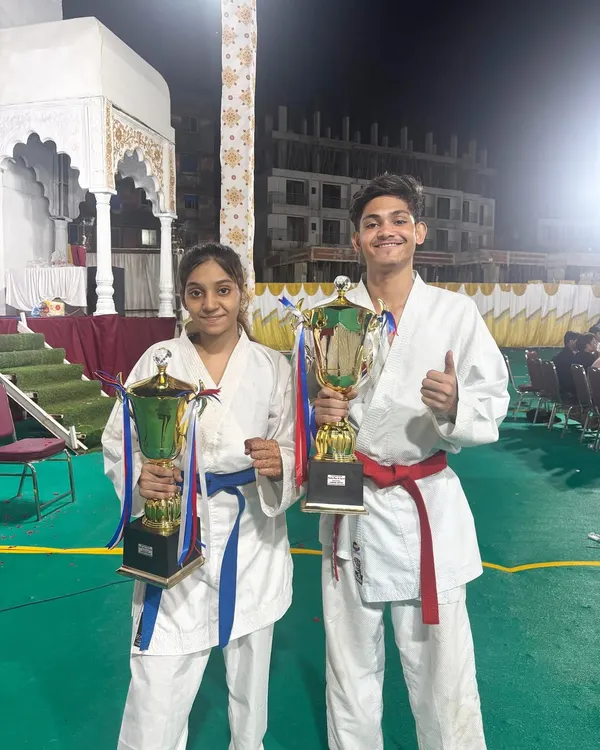 Taran and Shifa celebrating their Grand Championship wins in Kumite. This is the result of their relentless training and a testament to their skill and passion for karate.