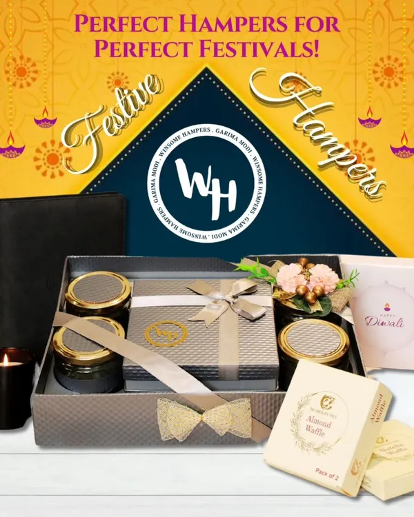 Perfect hampers for perfect festivals. This elegant Diwali gift box combines a sleek leather-style journal with gourmet treats and a scented candle for a modern festive feel.
