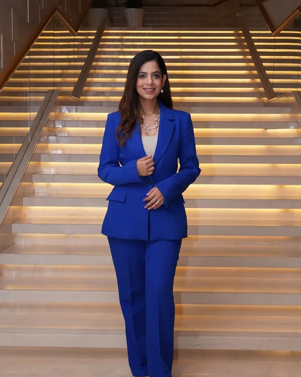 A powerful look in a tailored royal blue suit. For corporate events, a sharp suit helps me command the room with confidence and style.