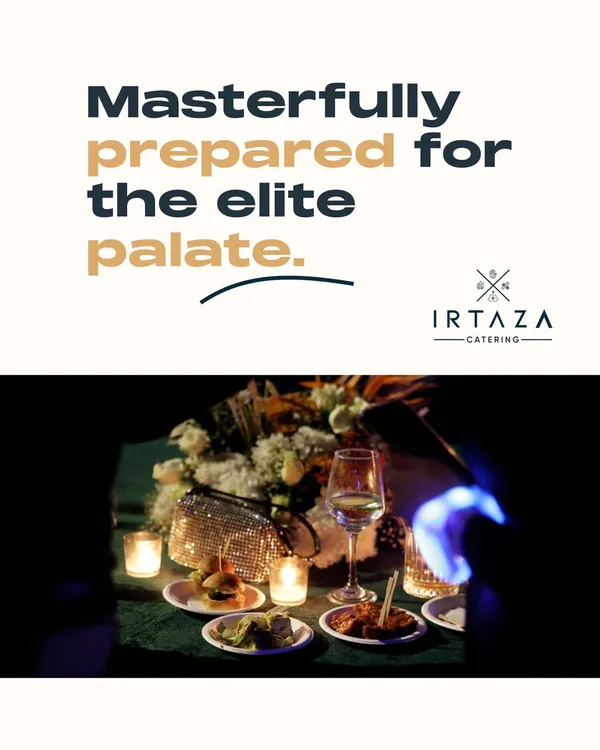A candlelit table at a private home party. Guests are enjoying wine and a selection of my gourmet appetizers, showcasing the sophisticated yet relaxed atmosphere I create for intimate gatherings.