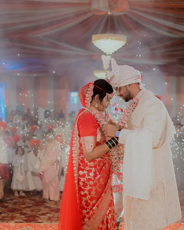 The Varmala ceremony is a highlight of any wedding. I captured this moment with sparklers in the background to enhance the magic and celebration of this Maharashtrian wedding.