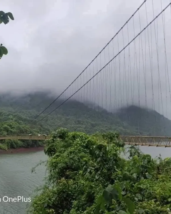 The Shivapura Hanging Bridge, a thrilling part of our Yallapura exploration trip, surrounded by misty hills and dense forests.