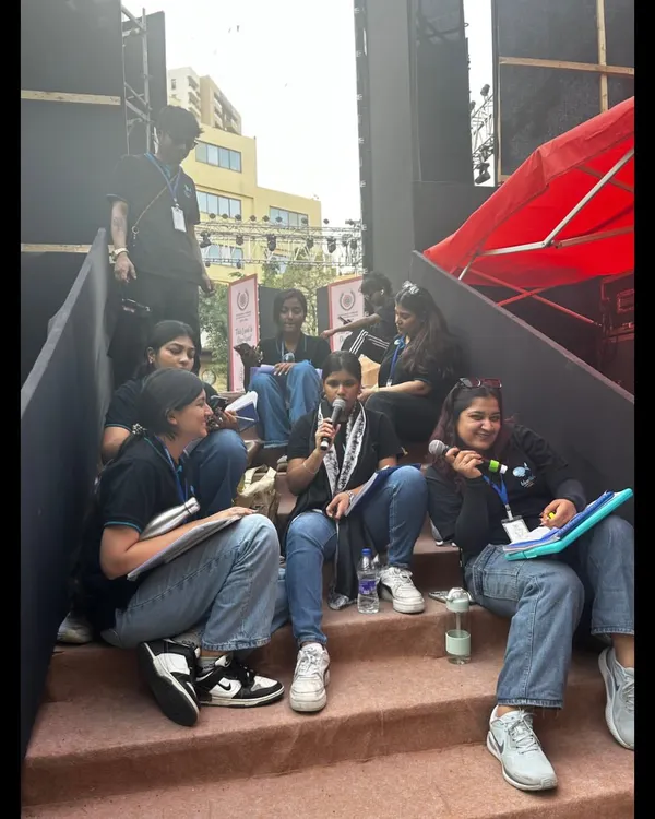 Our team members using walkie-talkies for crew coordination during the DAIS Annual Day. Clear and constant communication is the backbone of our backstage management.