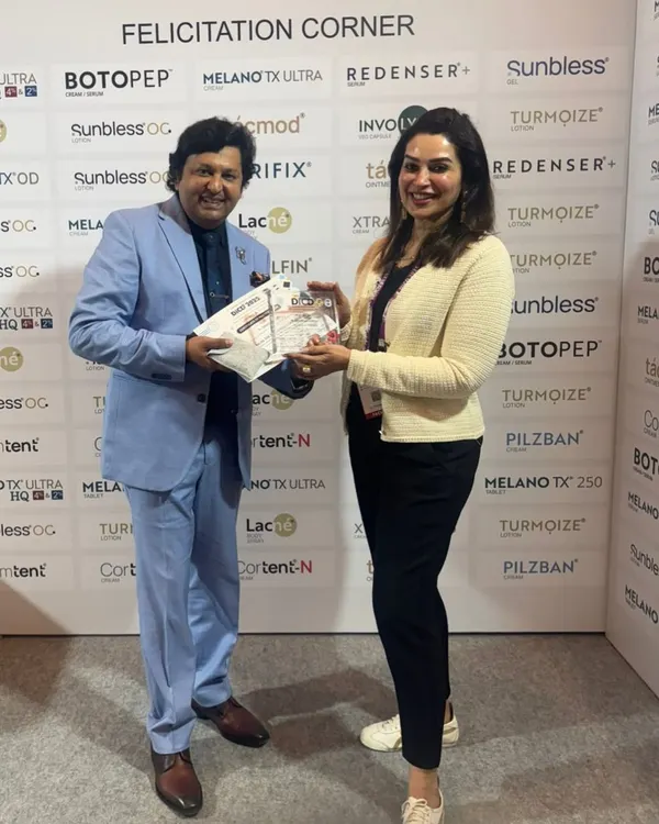 Receiving an award at a training event hosted by SAARCAAD. It is always an honor to be recognized by my peers and to contribute to the field of aesthetic dermatology.