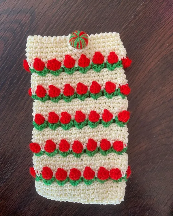 My new 3D tulip mobile pouch in a classic cream and red design. It's a stylish and hassle-free way to carry your phone while keeping it protected.