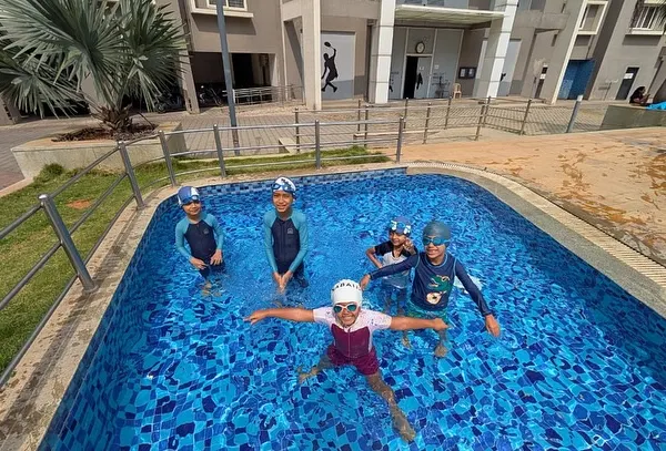 Our swimming classes are about building TRUST and creating WAVES of confidence! Look at these happy swimmers.