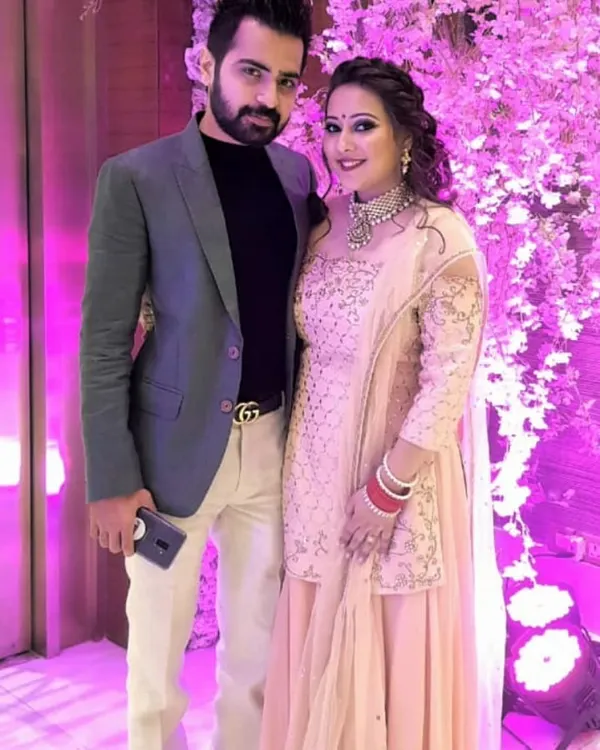 This happy client chose a peach sharara set by designer Pooja Peshoria for her event. The light color and delicate embroidery make it a graceful and stylish option.