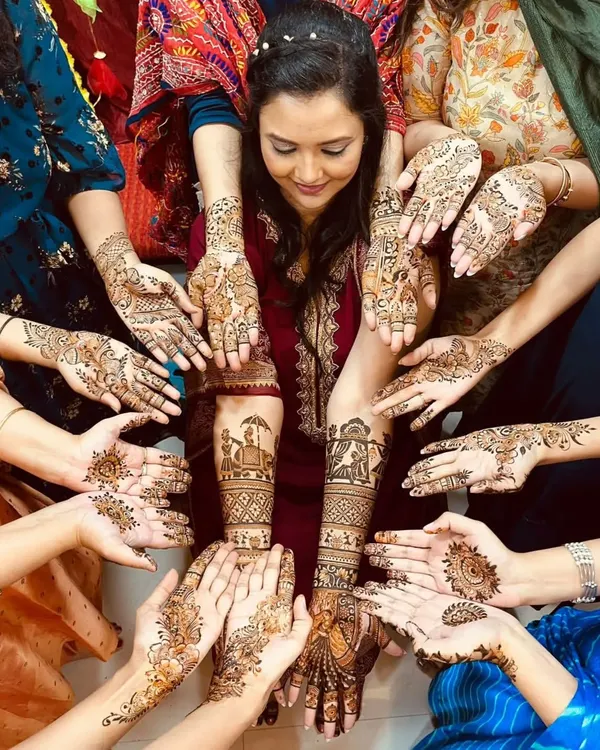This is what a mehendi celebration is all about. I love creating a central, stunning design for the bride-to-be while her bridesmaids and family show off their own unique henna, creating a beautiful, unified picture of joy.