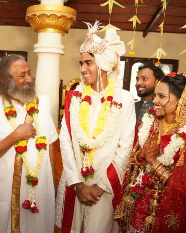 A moment of pure grace and joy. We believe a marriage is a sacred union, and having it blessed by Gurudev Sri Sri Ravi Shankar fills the beginning of this new chapter with profound spiritual energy. This couple radiates happiness in the serene environment of the ashram.
