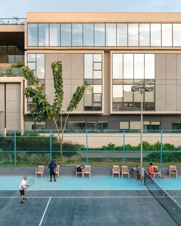 An overview of the Koramangala Club annexe, a 100-meter-long addition that provides new recreational facilities. The design mirrors the existing block structure to create a seamless integration between old and new.