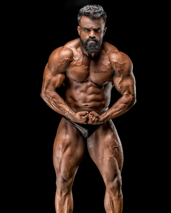 This is the result of years of discipline. A champion's physique isn't born, it's built with sweat and iron, day in and day out. This is the standard we aim for in my competition prep coaching.