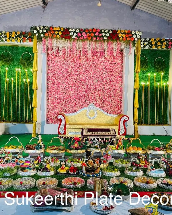This was a grand 45-plate setup for a puberty ceremony. The extensive arrangement on the carpet creates a stunning visual impact, perfect for such an important milestone celebration.