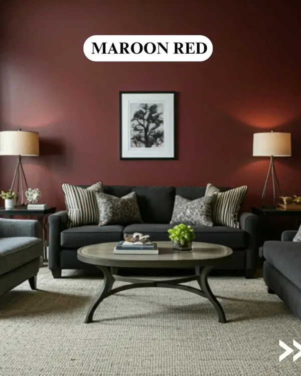A deep maroon red creates a cozy and dramatic atmosphere in this living room. This colour is perfect for creating an intimate and luxurious space, ideal for formal living or dining areas.