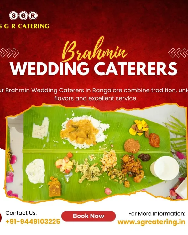 A top-down view of a traditional South Indian sadhya, served on a fresh banana leaf. This complete vegetarian meal, featuring rice, sambar, rasam, various poriyals, appalam, and payasam, represents the authentic culinary heritage we bring to your special occasions.