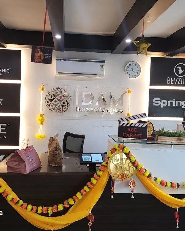 The Bollywood theme started right at the reception. I decorated the main desk with marigold garlands, a "Happy Diwali" balloon, and a fun red carpet clapperboard prop to set a festive and cinematic tone for the office party.