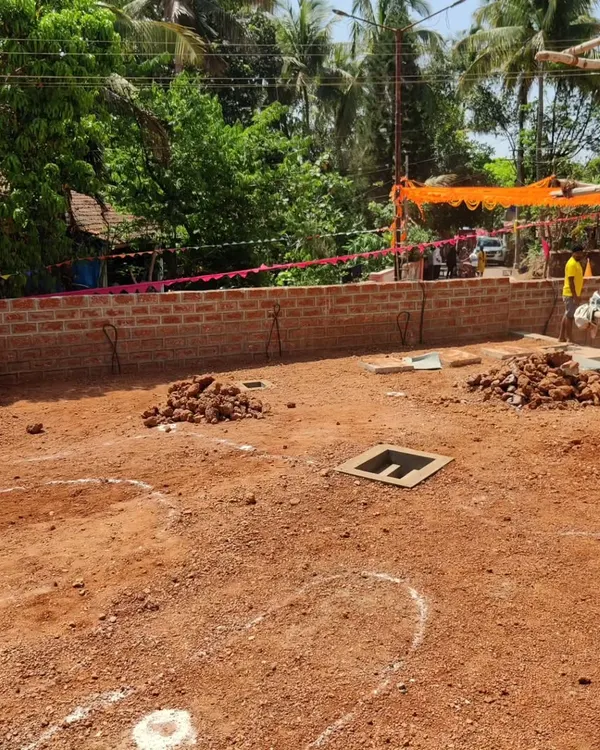 Every great garden starts with a blank canvas. This is the 'before' shot of a villa project in Goa, showing the site cleared and marked out, ready for transformation.