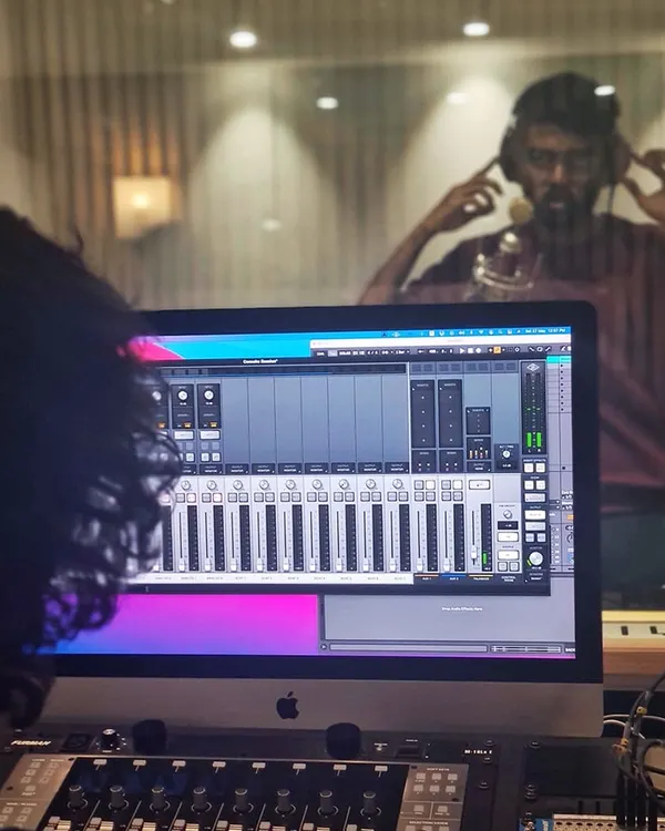 From the control room to the live room, our studio is ready for your next project. This image shows a recording session in progress, utilizing our professional-grade equipment.