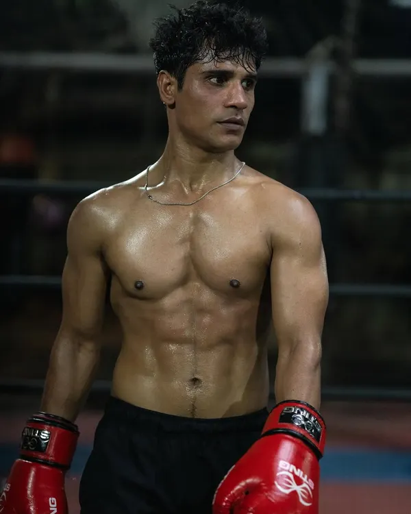 This is what dedication looks like. We build fighters from the ground up, focusing on core strength, sharp conditioning, and the mental toughness to match. This physique isn't just for show; it's forged through countless hours of disciplined training for peak performance in the ring.