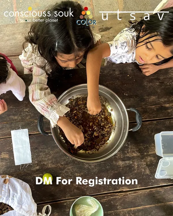 Two young girls get their hands messy while learning about natural dyes. Our workshops are a perfect activity for kids, allowing them to explore their creativity in a safe, eco-friendly environment.