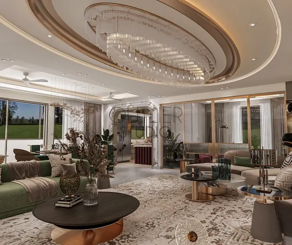 This grand living area is defined by its sculpted architectural details. I designed an elliptical ceiling with a massive crystal chandelier and curved walls to create a sense of softness and flow, while a backlit onyx feature wall adds a warm, artistic glow.