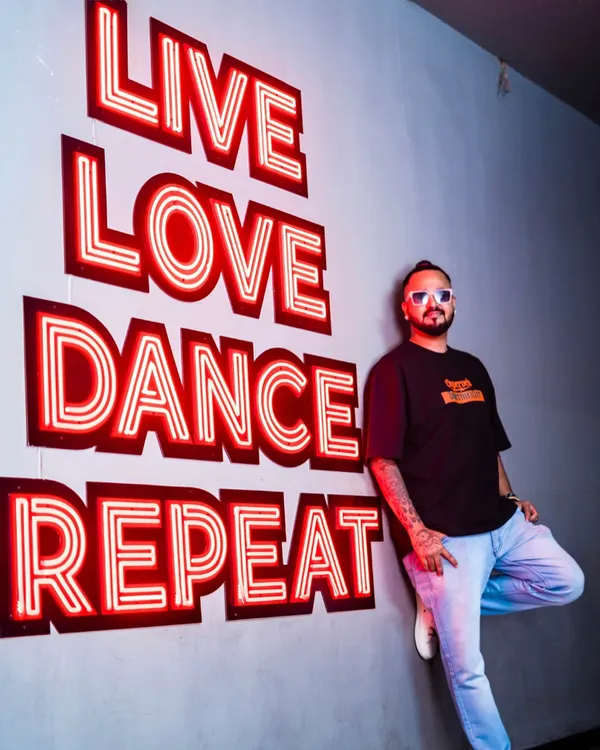 Live, Love, Dance, Repeat. This isn't just a sign on the wall; it's the motto I live by. This is me in my natural habitat.