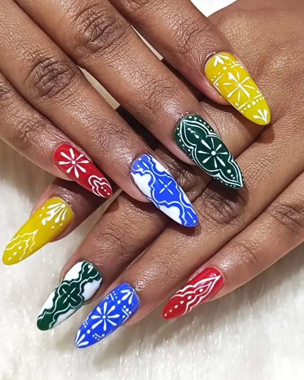 This is what Navratri glam looks like. I hand-painted every intricate detail on these long coffin nails, using vibrant festive colors to create a look that’s ready for the dandiya floor.