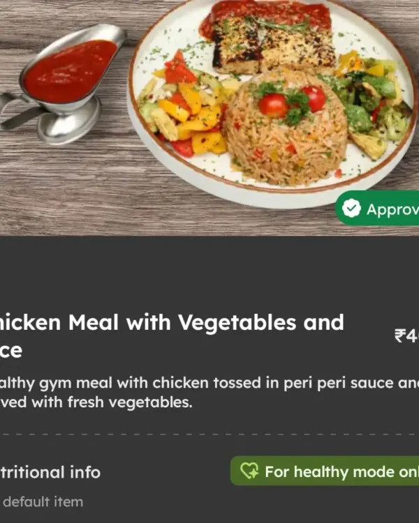 This is a complete, balanced gym meal featuring chicken in a flavorful peri peri sauce, served with fresh vegetables and rice. It's designed to provide the protein and nutrients you need for muscle recovery after a workout.