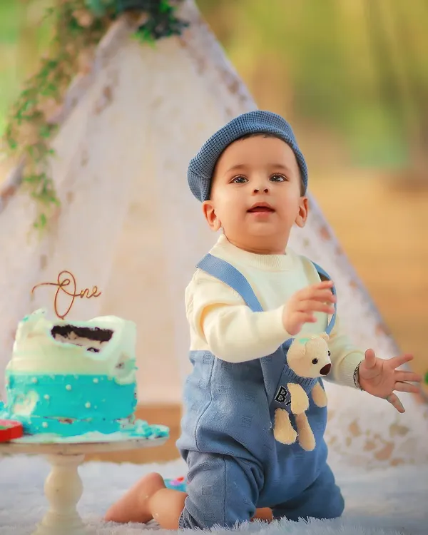 The best part of a cake smash is the smash itself! We capture every happy, messy moment as your little one dives into their first birthday cake.