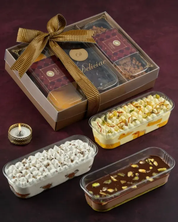 This is what a box of happiness looks like. Our fusion dessert tubs, including Kunafa Chocolate, Kesar Pista, and Gulab Jamun Crème, are perfect for gifting or enjoying yourself.