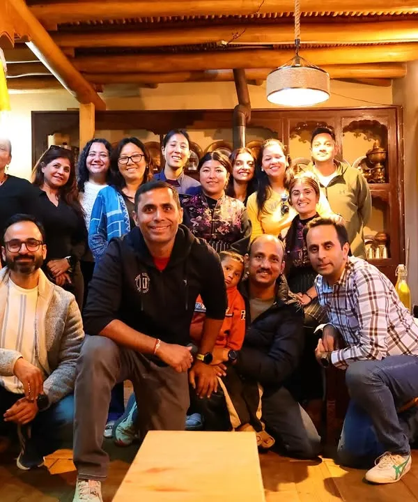 Our team enjoying a delicious and well-earned lunch at a local Ladakhi kitchen. Sharing meals together is a huge part of our community experience.